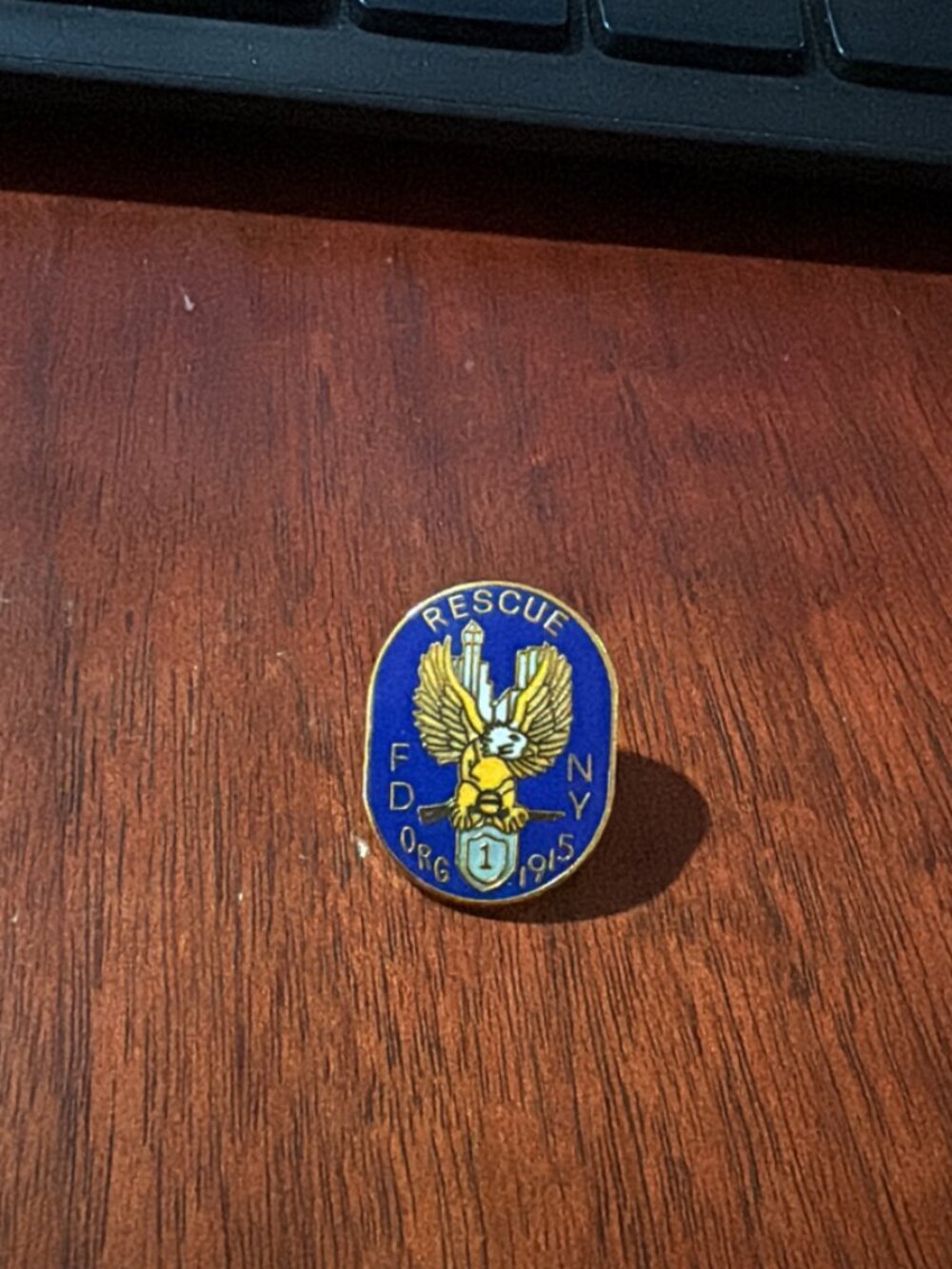 Oval enamel lapel pin for FDNY Rescue Company